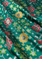 Load image into Gallery viewer, Panchompali Ikat silk saree in drak green