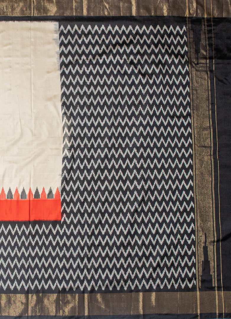 Cream and black Ikat silk saree