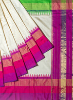 Load image into Gallery viewer, Ikat silk saree in white with multi color border.
