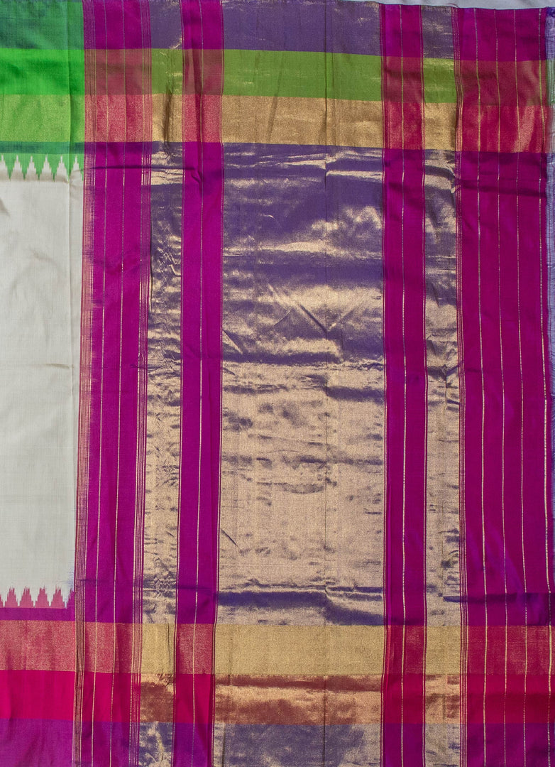 Ikat silk saree in white with multi color border.