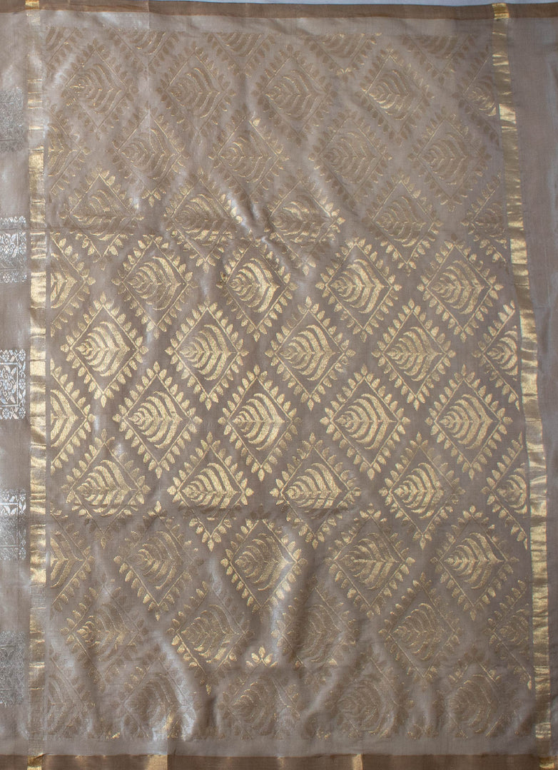 Grey Tussur sillk saree with golden an silver zari work